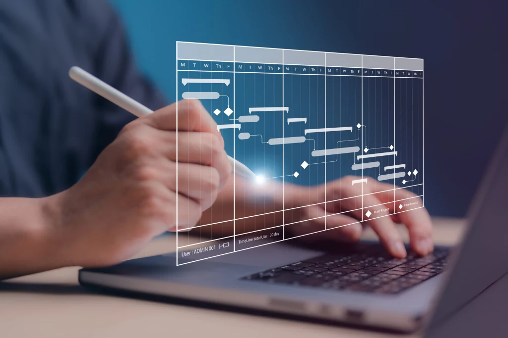 profissional de ti documentando processos no papel e no computador